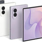 Four foldable smartphones shown standing upright, with three in back and one in front displaying a pink and purple abstract wallpaper. The devices are shown in dark gray, white, and light lavender/purple metallic finishes against a clean white background.