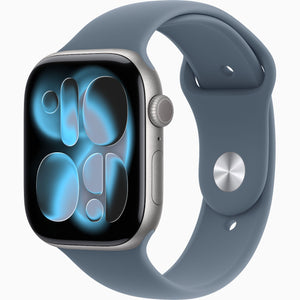 A smartwatch with a slate blue band and a silver-toned case, shown at an angle on a plain light gray background. The watch face displays a blue and black digital pattern.