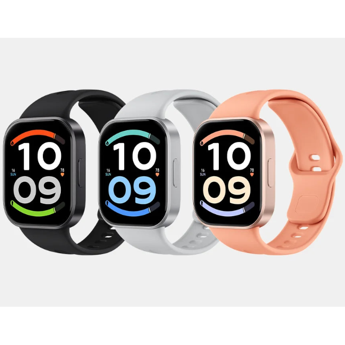 Three smartwatches with rectangular black screens and colorful bands are shown side by side on a light gray background. The bands are black, white, and peach.