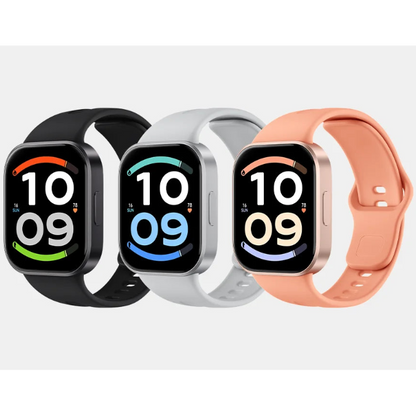 Three smartwatches with rectangular black screens and colorful bands are shown side by side on a light gray background. The bands are black, white, and peach.